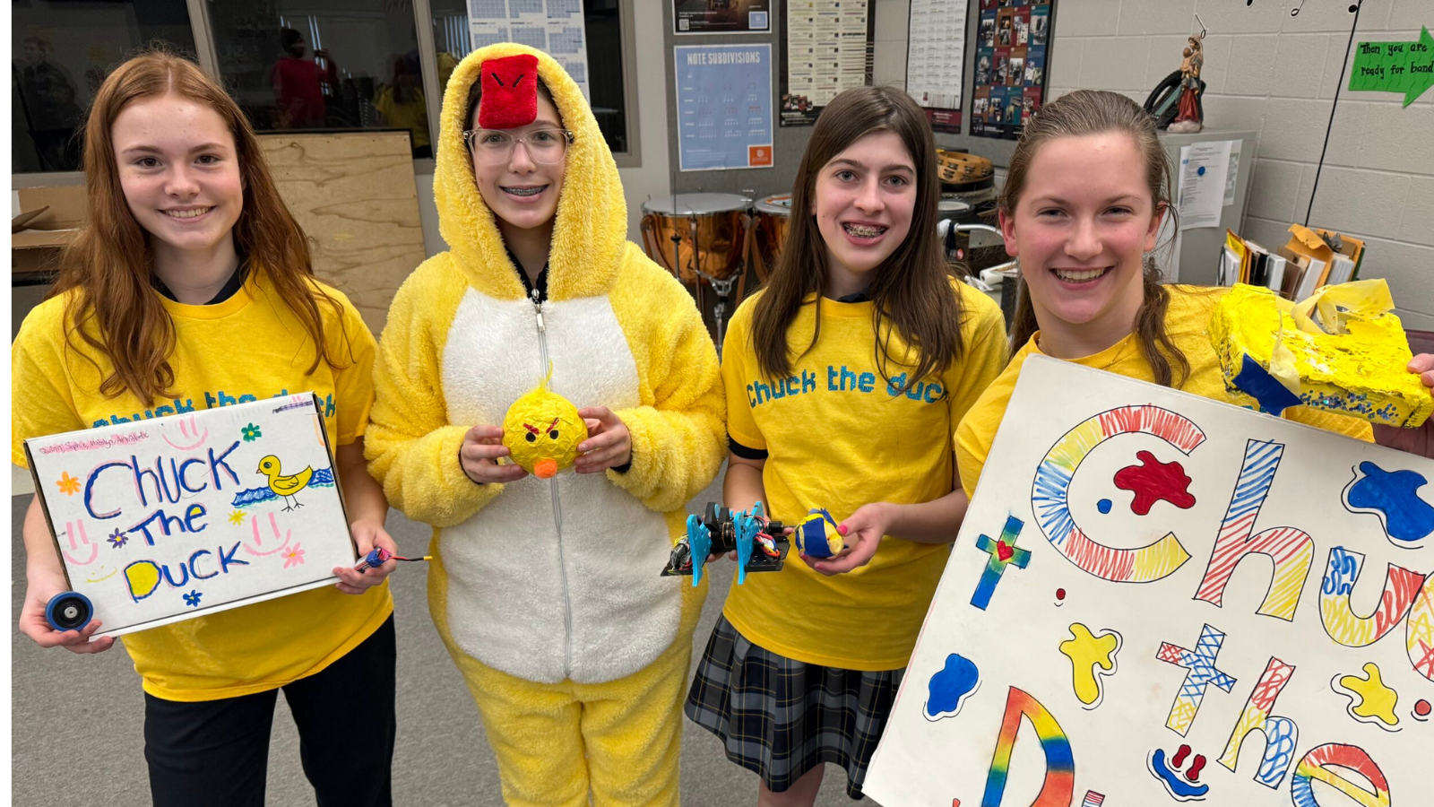 SRL Team - Chuck the Duck. Full costumes, shirts, broken robot, and posters.